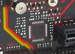Empty solder pads for the missing Super I/O controller